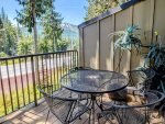 Table and chairs on the private balcony with views of Mt. Hood Skibowl